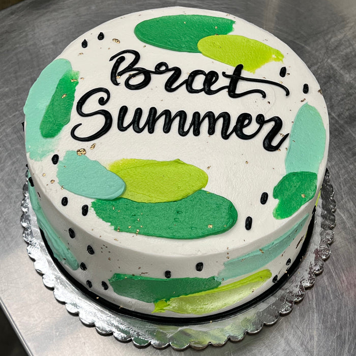 painted summer round cake with green and blue tones