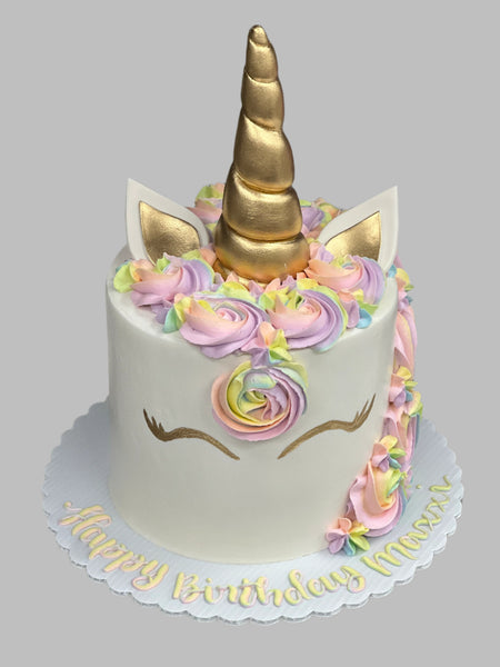 unicorn birthday round cake with pastel swirls. child or adult birthday